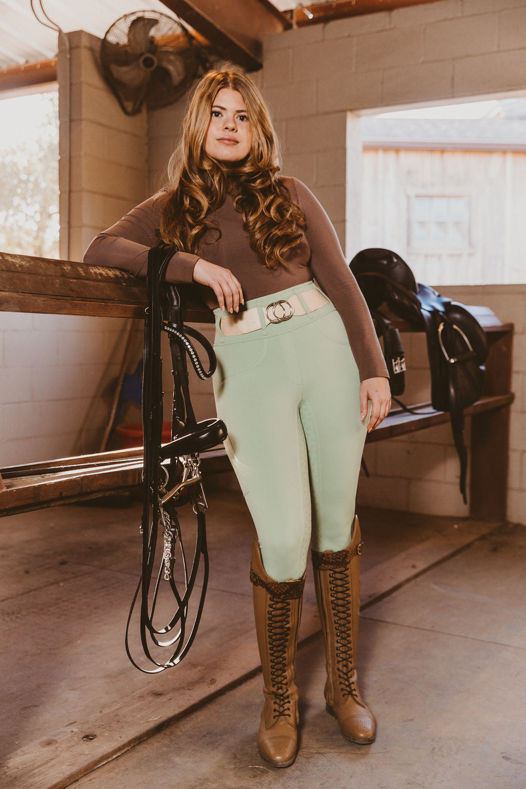 Canter Culture's green riding tight breech hybrid is a soft color for spring.