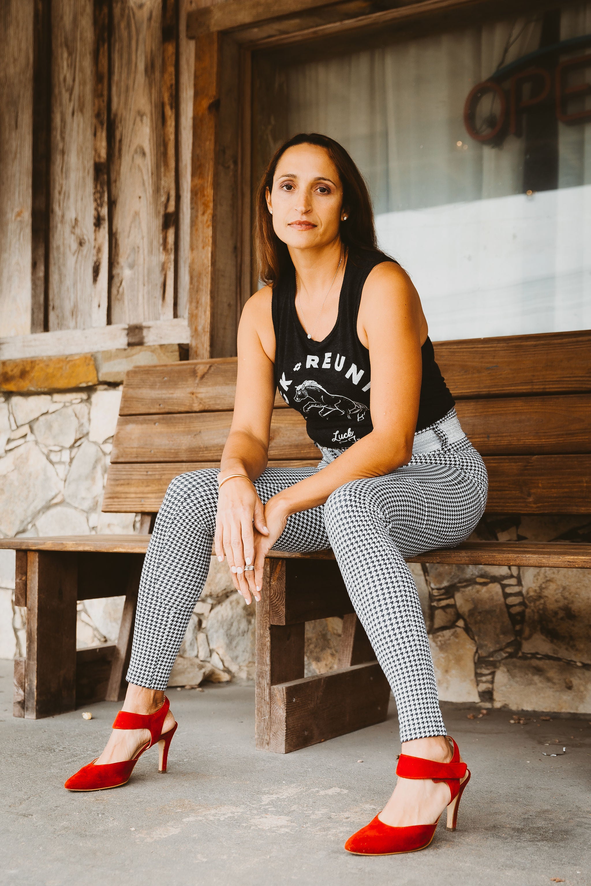 Red high heels with houndstooth leggings is a hot look.
