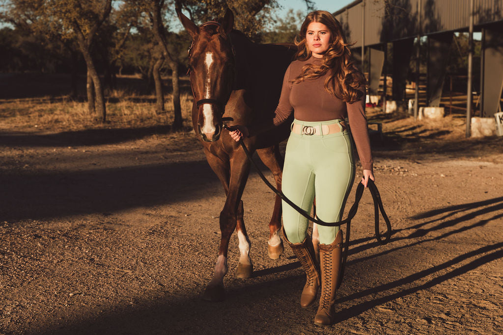 Canter Culture's riding tight breech hybrid comes in a pretty sage green.